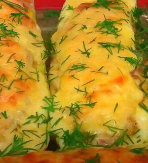 Вкусные фаршированные фаршем кабачки с сыром и чесноком, запеченные в духовке